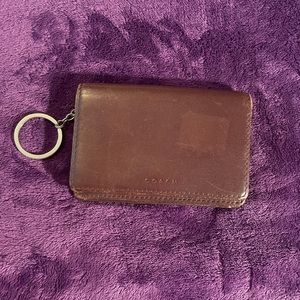 Excellent used condition (it has a square discoloration from the tag)